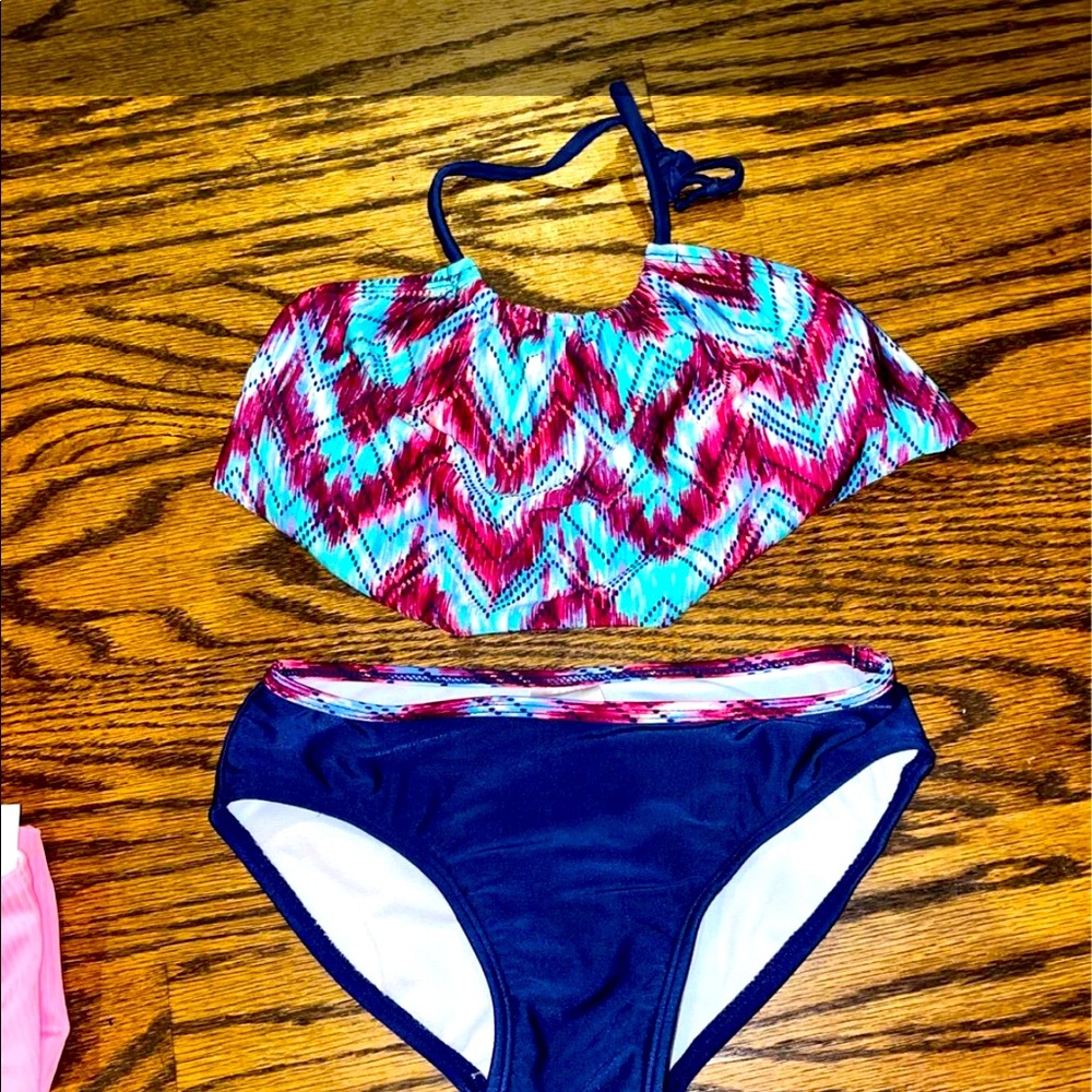 Adorable girls two-piece swimsuit says 7/8!